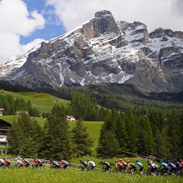 Riders pass in a peloton during the Dolomites cycling Weekender