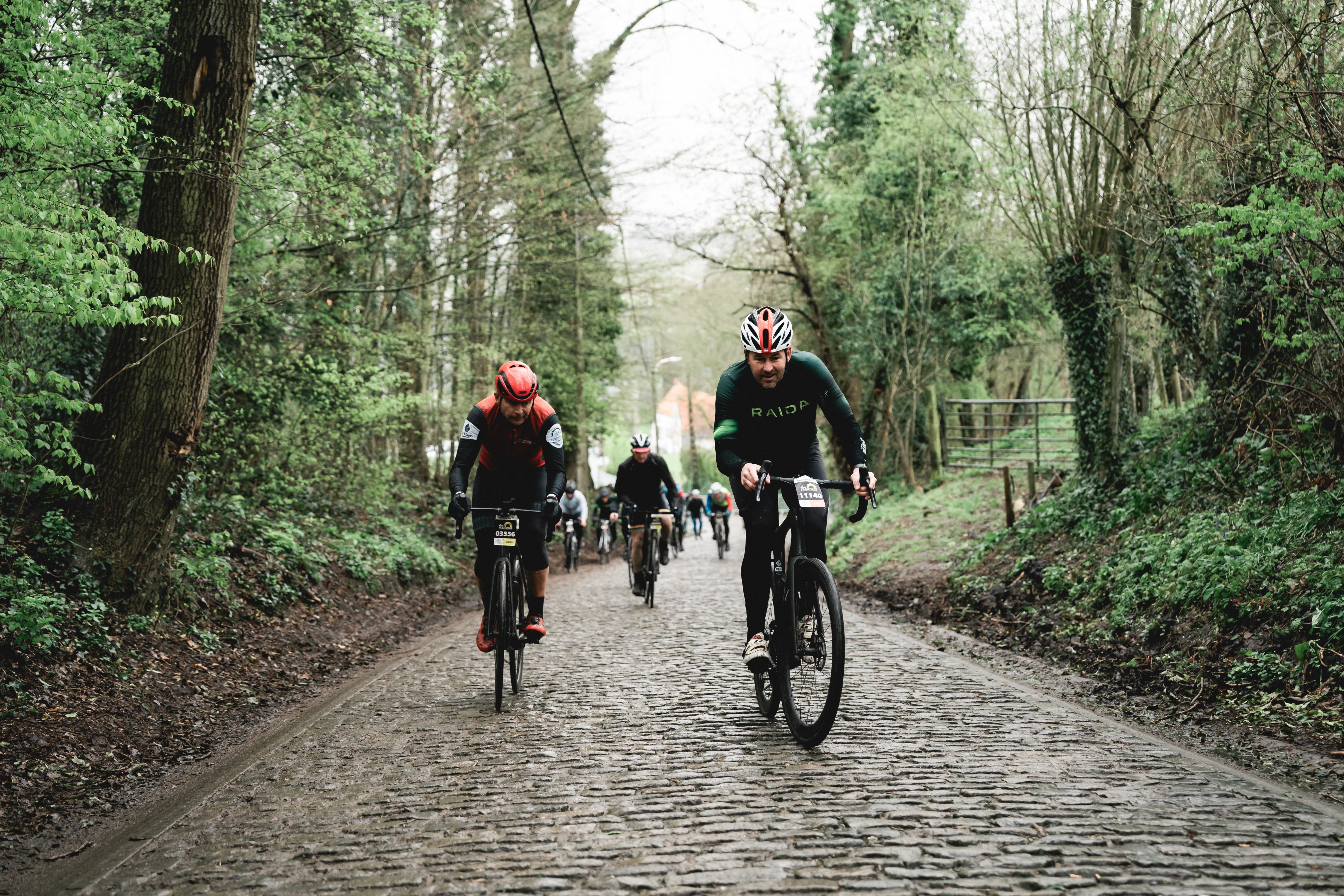 Riders tackling the cobbles during the Spring Classics trip