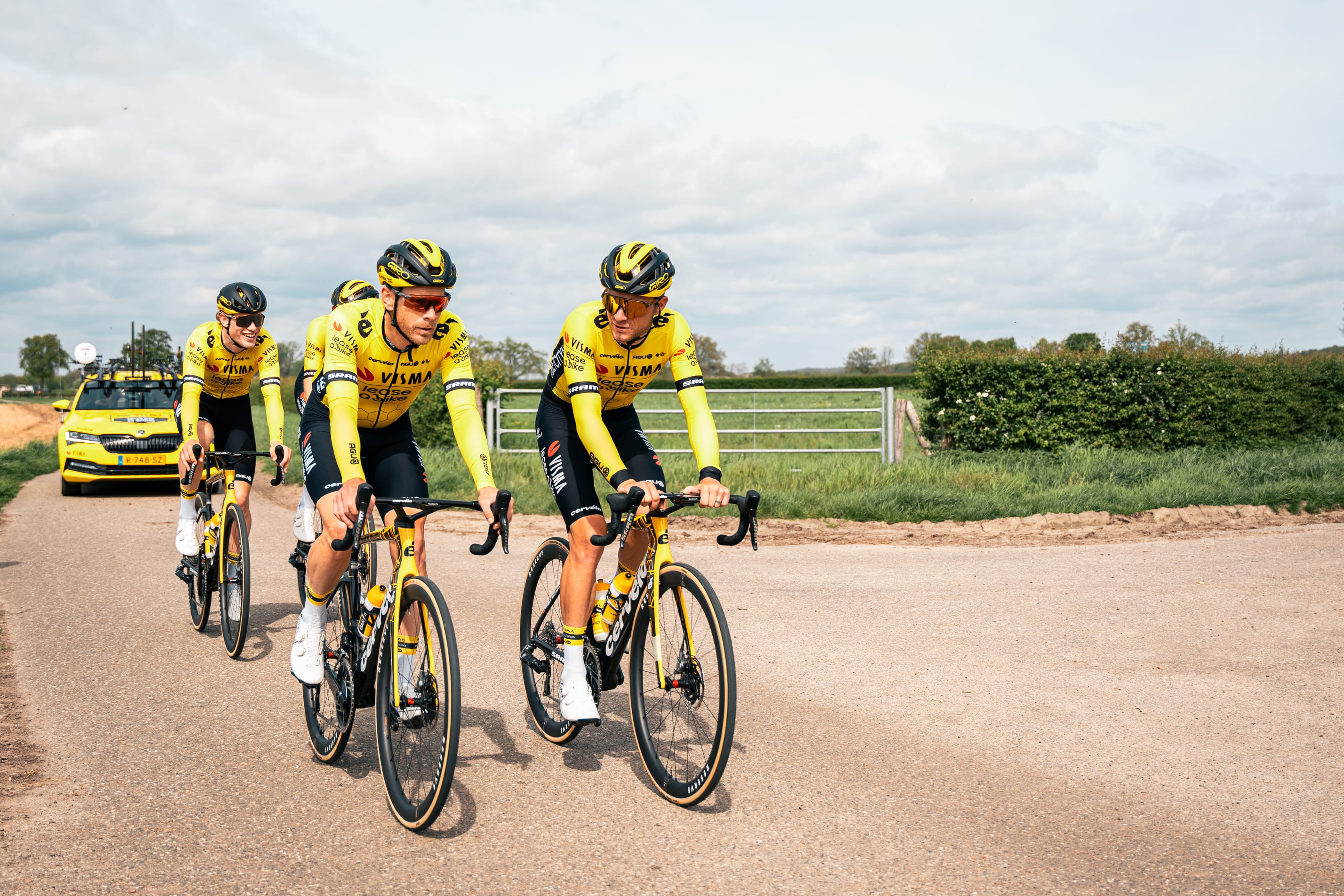 Team Visma | Lease a Bike cyclists riding in formation, ahead of the Team Visma news that the team has entered in to partnership with Sportive Breaks.