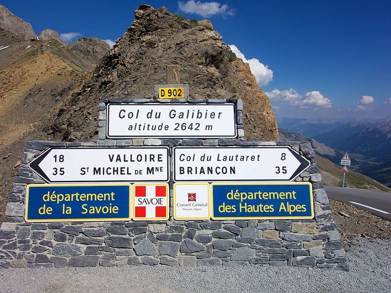 Signs showing the plethora of climbs available in the Alps region, some of which will be tackled during the Route Grandes Del Alpes