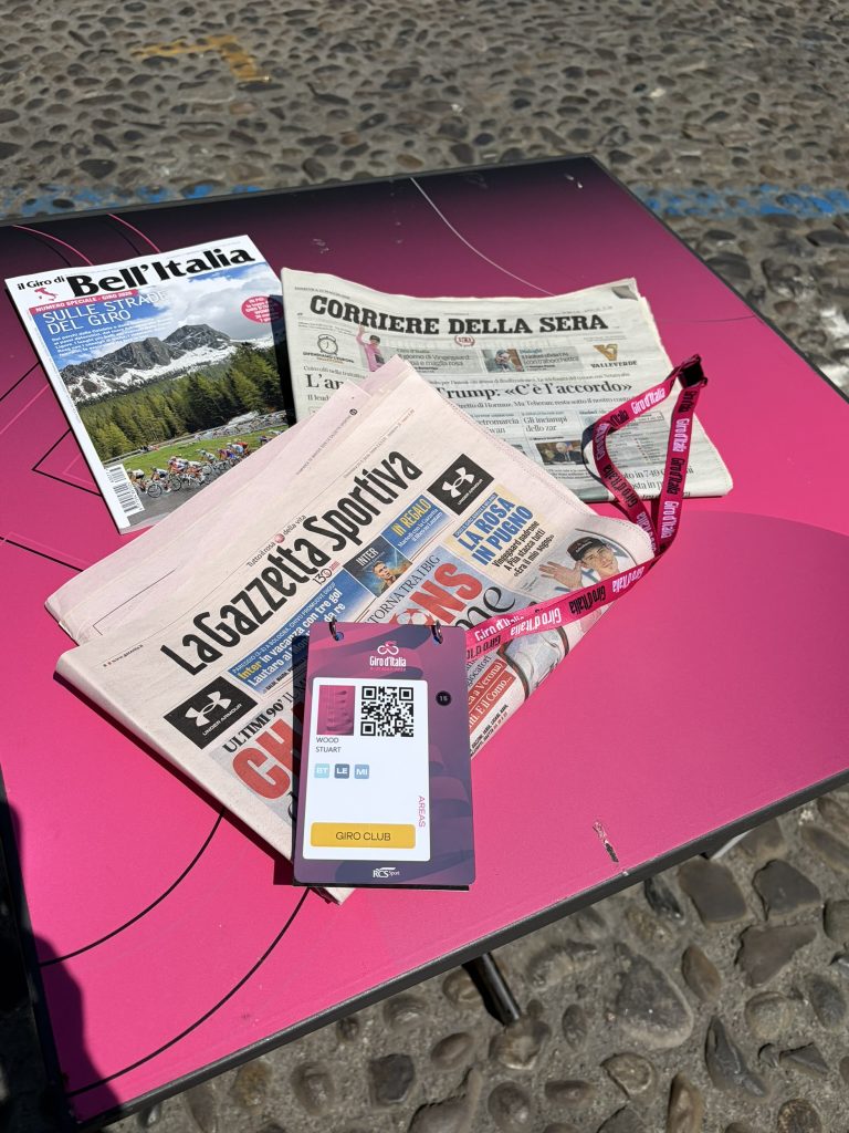 Giro d'Italia access all areas pass with assorted Italian newspapers